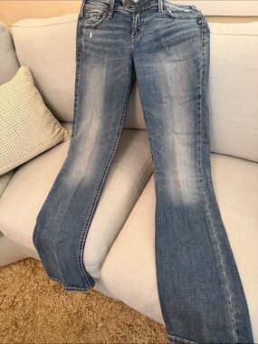 Silver Jeans Women's Faded Blue Flare Jeans